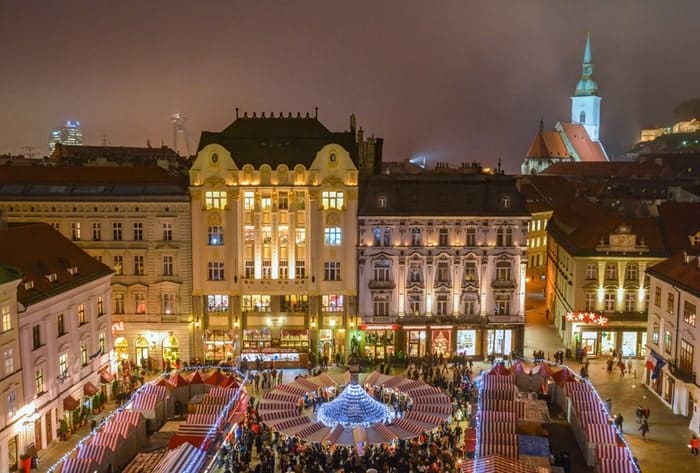 Christmas market in Bratislava main Square at sunset