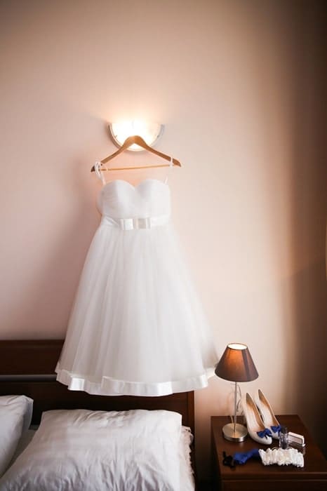 short white wedding dress hanging