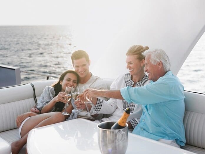 people on yacht family relaxing enjoying the day sitting