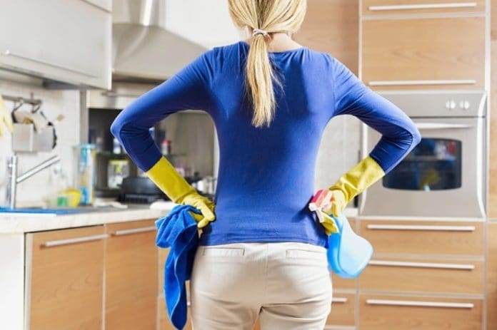 woman assessing housekeeping job at home