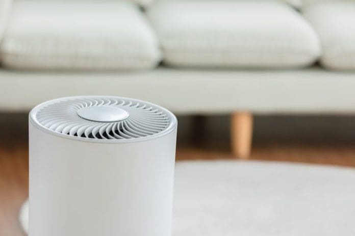 Close up Air purifier in cozy white living room for filter
