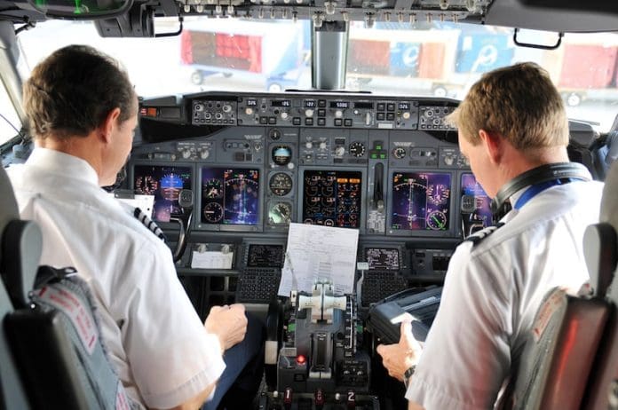 Pilots in the cockpit during a commertial flight