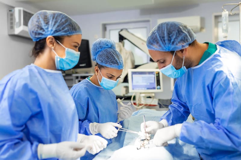 Doctors performing surgery hospital
