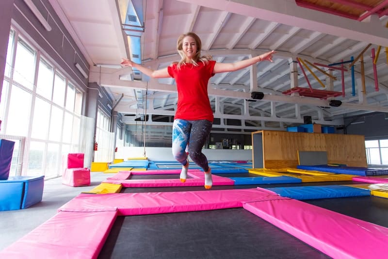Fitness, fun, leisure and sport activity concept trampoline park