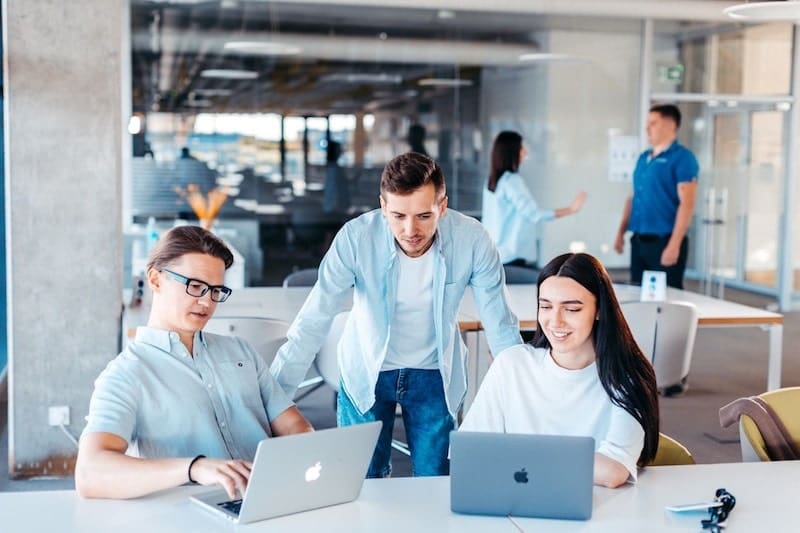 A group of professionals exploring top email marketing for agencies, focusing on strategies for delivering personalized and targeted campaigns