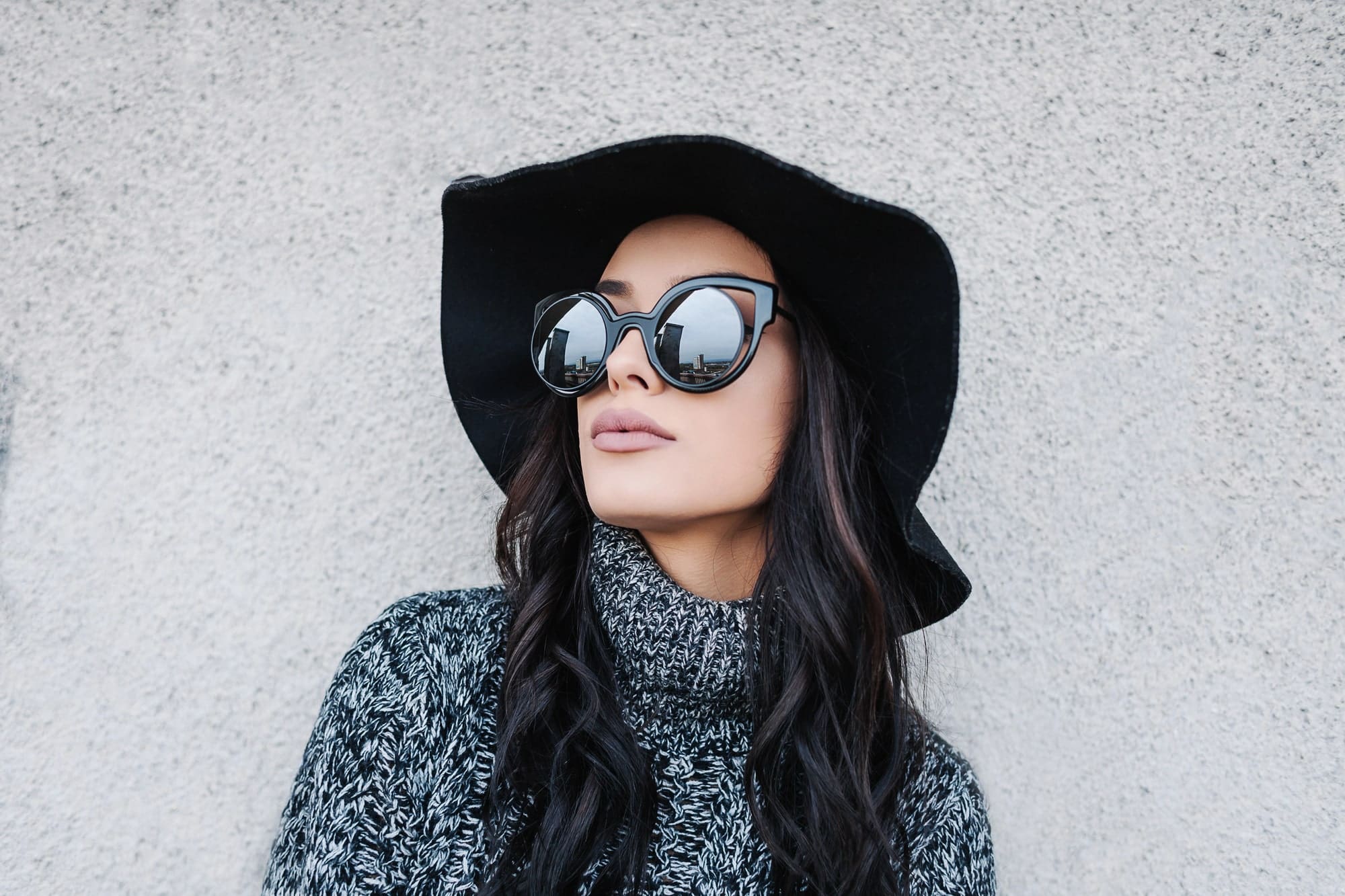 Woman wearing trendy fall outfit